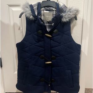 buffalo plaid puffer vest with faux fur trimmed hood